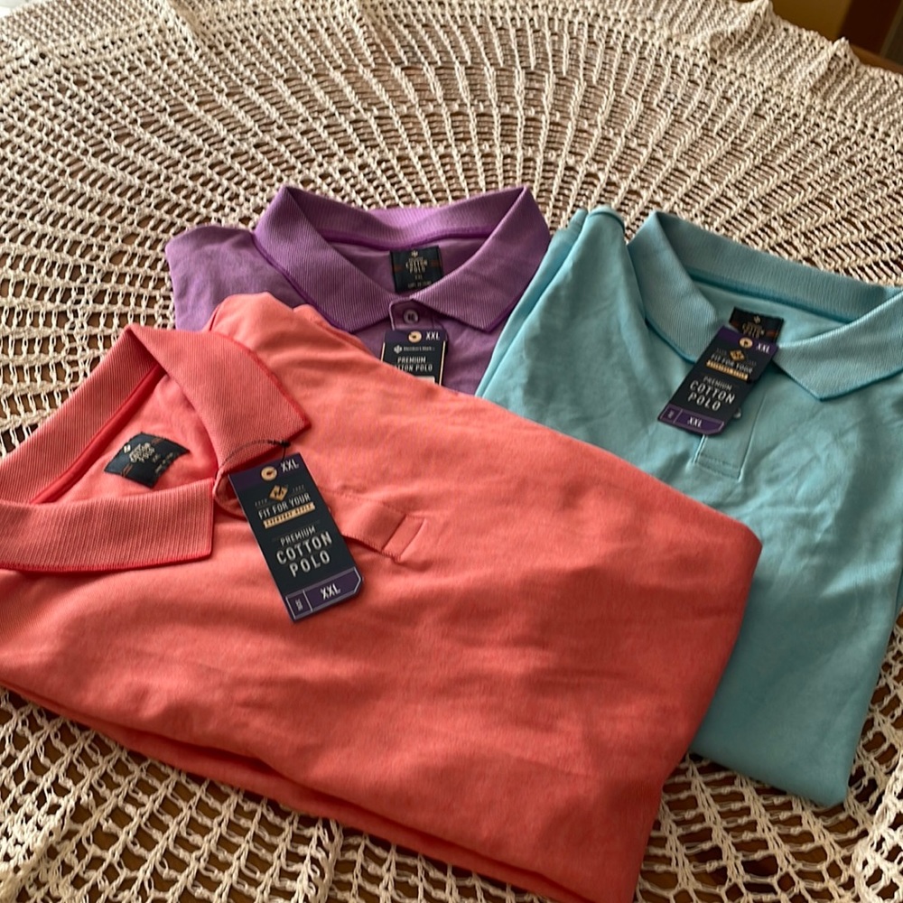Three polo shirts, short sleeves, new with tag. Blue, orange and purple.